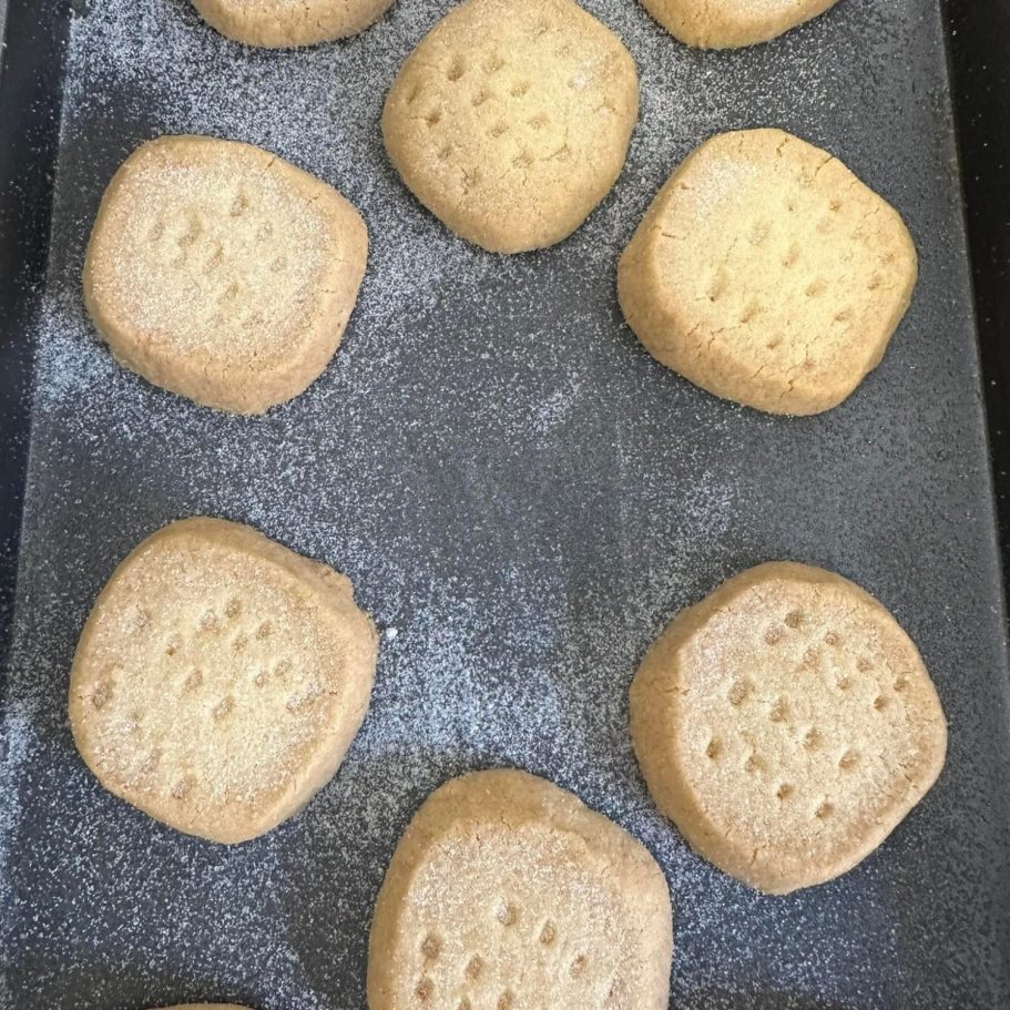 Baked traditional Highlanders shortbread Baked traditional Highlanders shortbread dusted with flour on a baking tray.